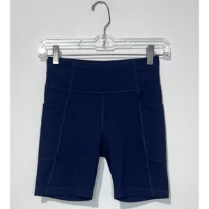 Athleta Girl Stash Your Treasures Bike Shorts L 12 Navy Pockets Drawstring Logo